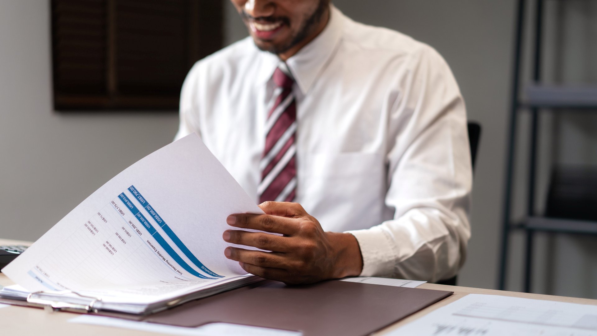 Business professionals reviewing SARS tax dispute documents
